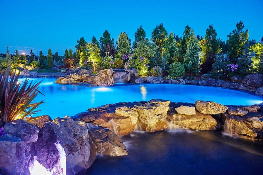 Dennis7Dees-Dream-Home_261 pool in landscape at night