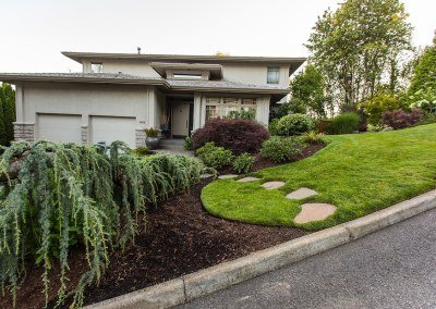 Natural Stone Pathway through Front Yard Lawn by Dennis' 7 Dees Landscaping