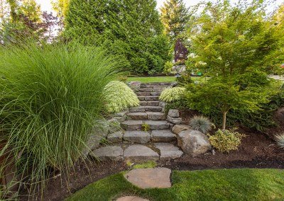 stone steps with ornamental grasses