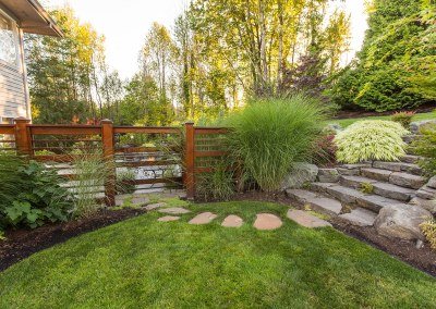 stone steps path and wood screen in landscape