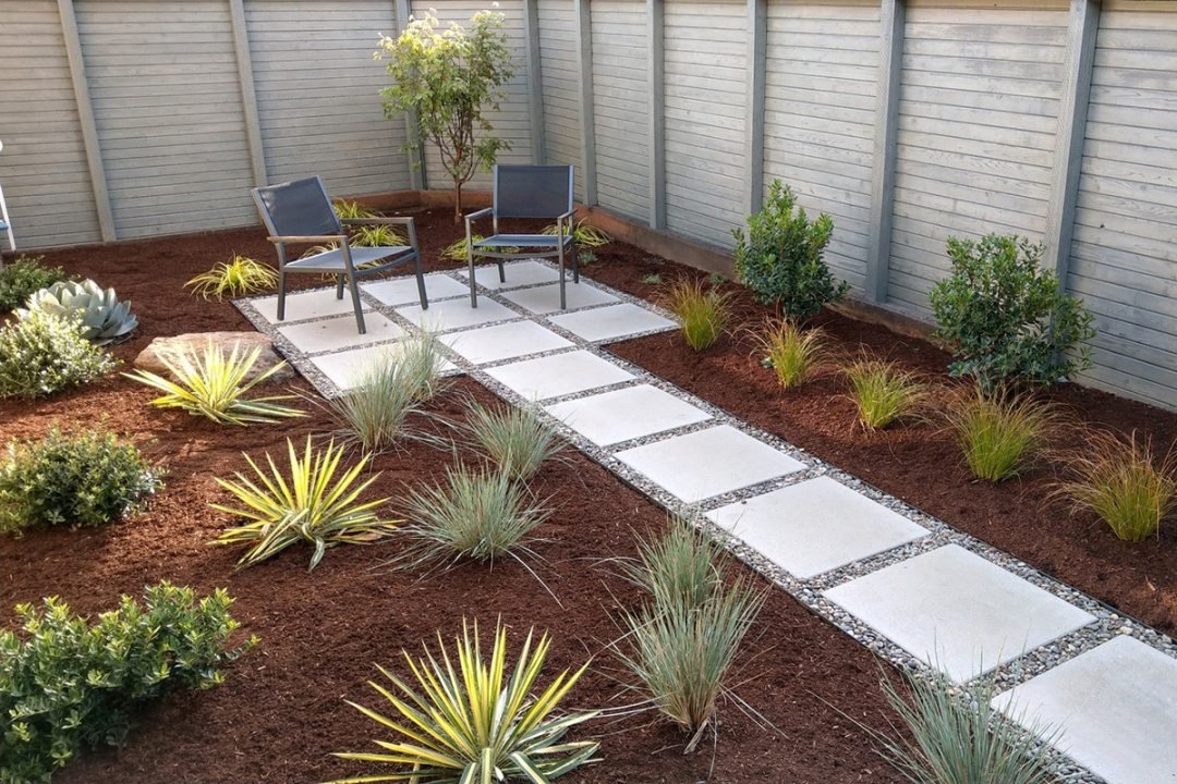 Simple xeriscaping landscaping design - by Dennis' 7 Dees Side yard with walkway and chairs with plants - by Dennis' 7 Dees