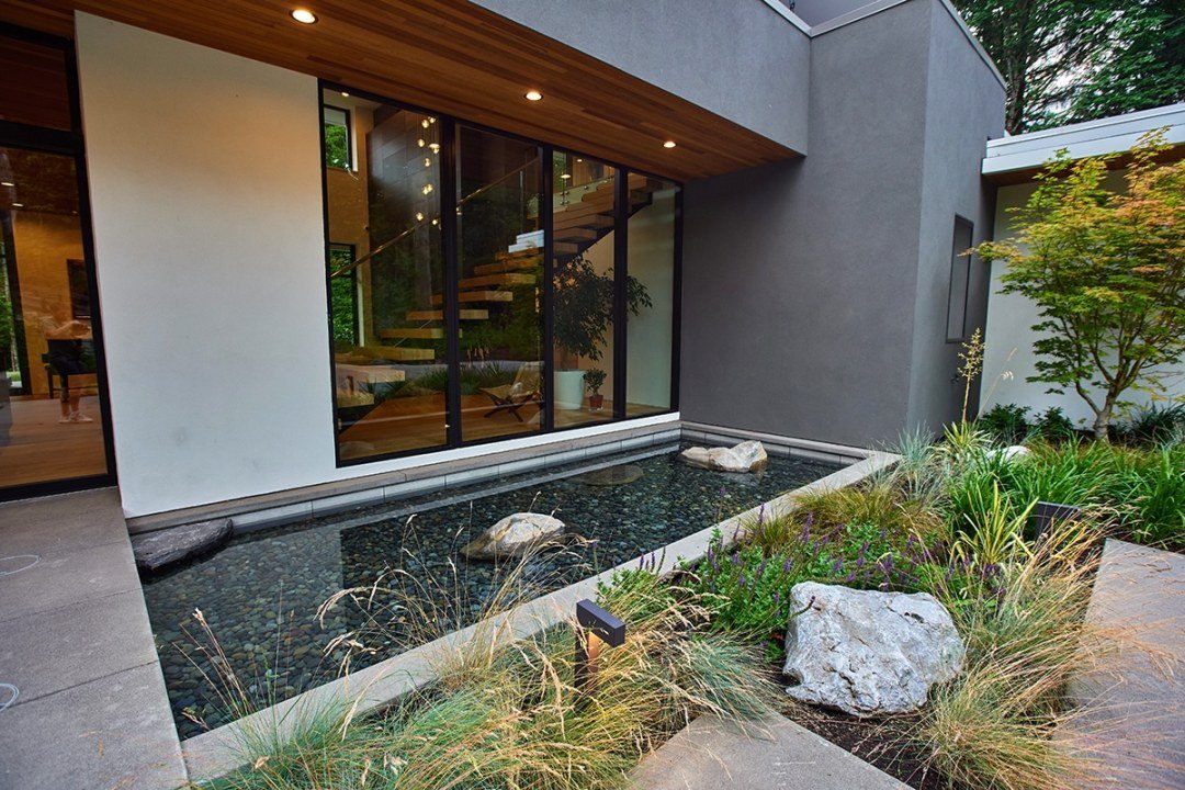 Serene modern reflecting poolwater feature by Dennis' 7 Dees Landscaping Serene modern reflecting pool water feature by Dennis' 7 Dees Landscaping
